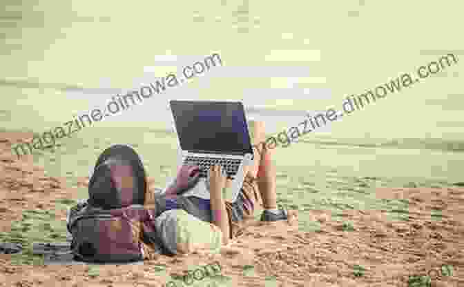 A Digital Nomad Sitting On A Beach With A Laptop 101 Things A Digital Nomad Would Say