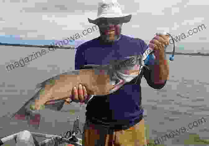 An Image Of An Angler Holding A Large Channel Catfish Caught In The Raccoon River Dallas County Iowa Fishing Floating Guide Book: Complete Fishing And Floating Information For Dallas County Iowa (Iowa Fishing Floating Guide Books)