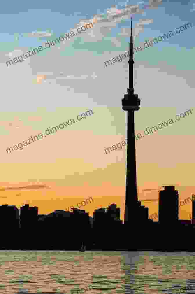 CN Tower At Sunrise, A Majestic Silhouette Against The Vibrant Hues Of The Morning Sky Sampler 9 Ontario In Colour Photos: Saving Our History One Photo At A Time