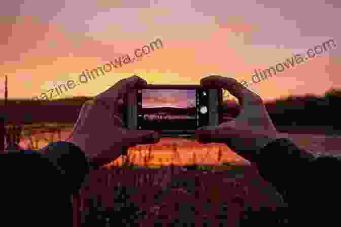 Man Using IPhone To Take A Photo Of Stunning Mountain View Don T Travel Without IPhone Jimmy Chang